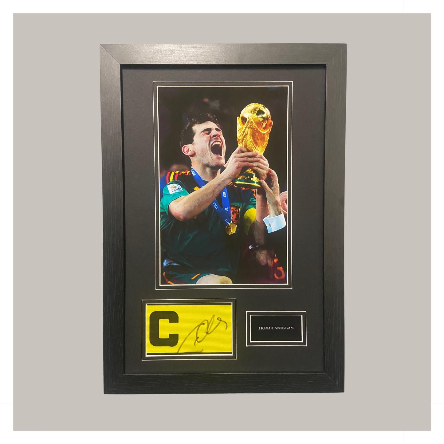 HAND SIGNED IKER CASILLAS CAPTAINS ARMBAND MOUNTED AND FRAMED SPAIN