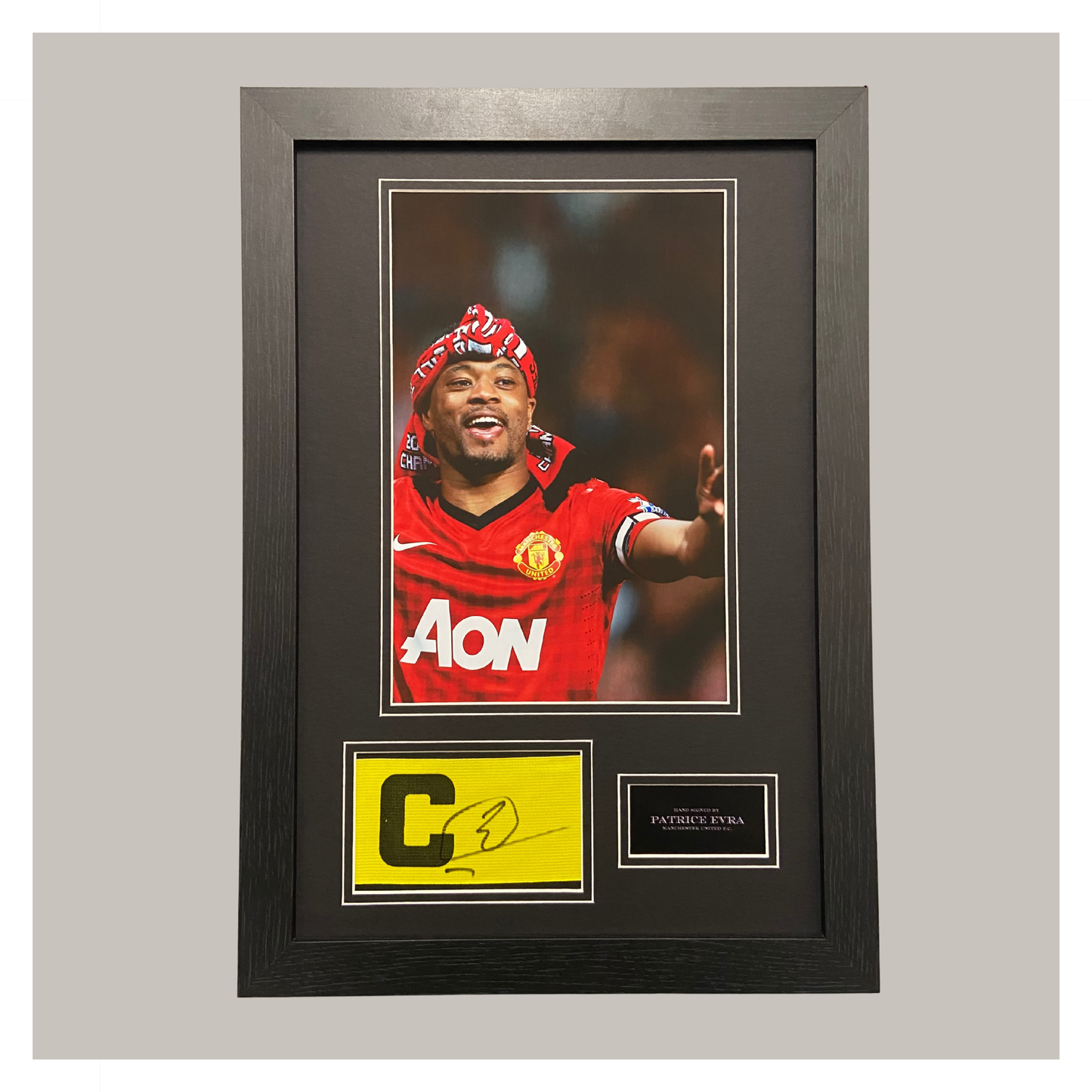 PATRICE EVRA SIGNED CAPTAINS ARMBAND DISPLAY