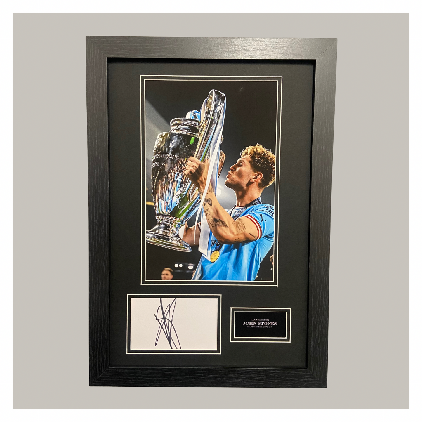 JOHN STONES HAND SIGNED CHAMPIONS LEAGUE DISPLAY
